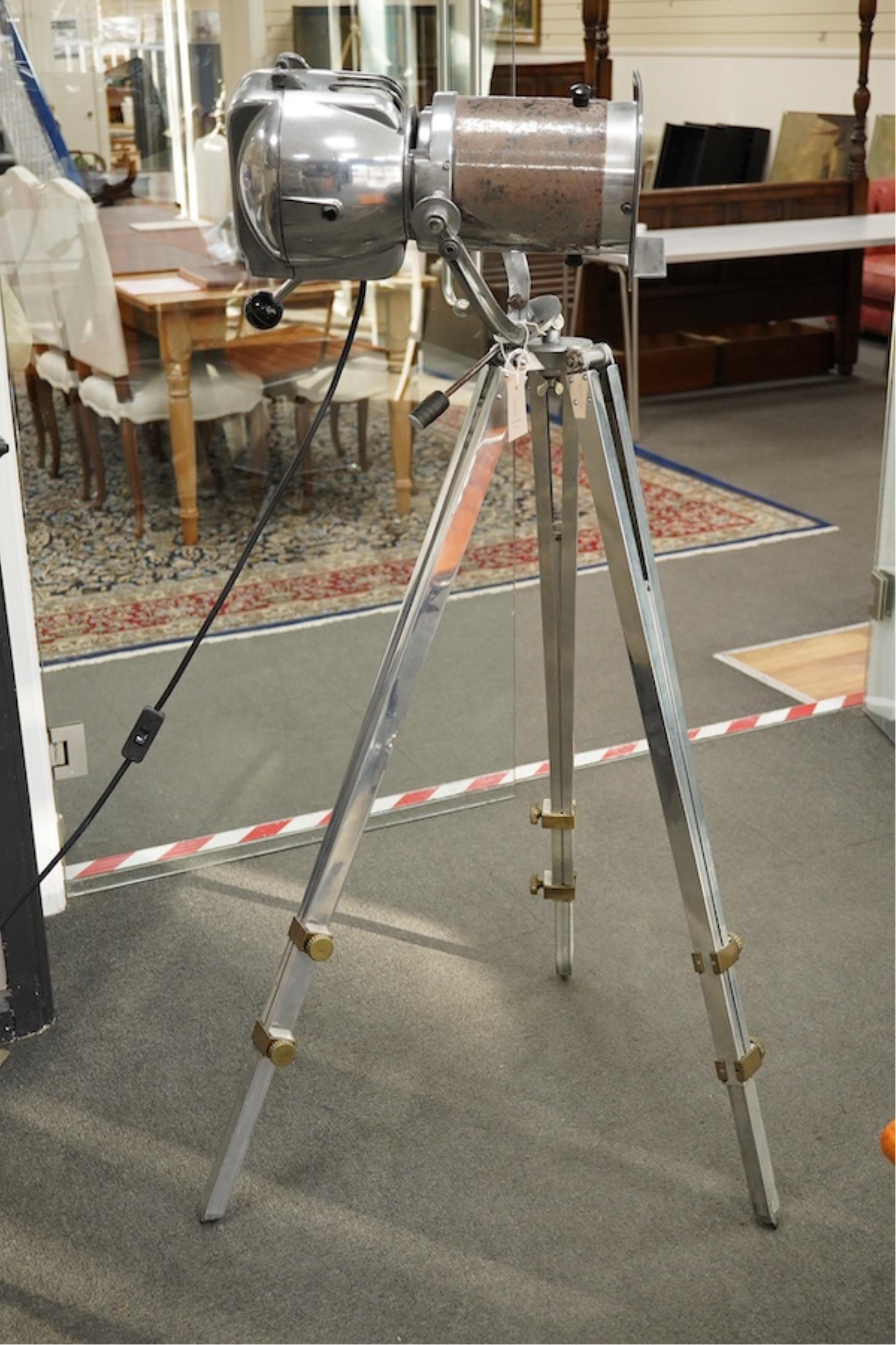 A vintage 'Strand Electric' studio lamp on an adjustable tripod, height 132cm. Condition - fair